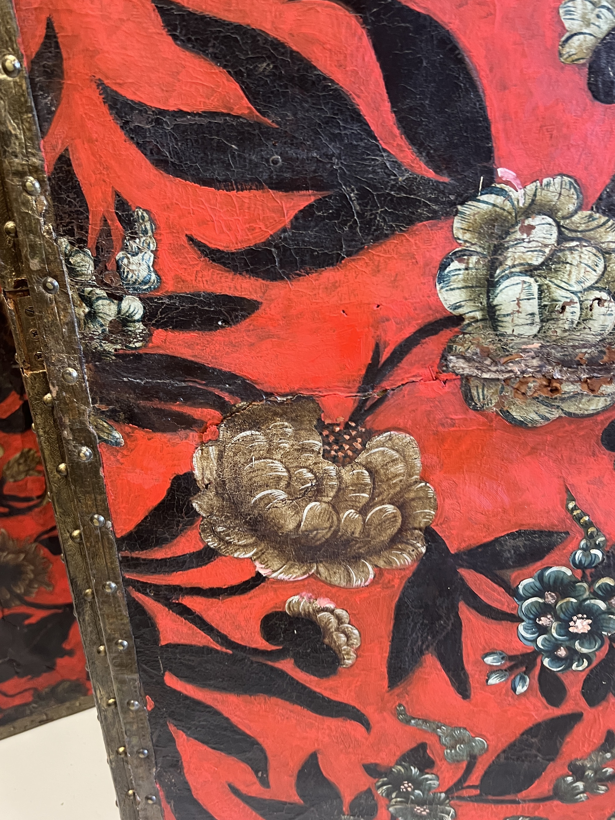 A 19th century Spanish leather three fold dressing screen re-painted by Ricardo Cinalli for the current owner, each panel width 57cm, height 175cm